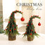 Red wry neck Christmas tree ornament displayed on desktop