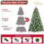 Fully decorated Christmas tree in living room setting with warm lighting