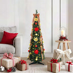 Pre-lit artificial Christmas tree with warm white LED lights standing in a festive room setting