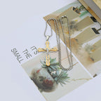 Jesus cross pendant showcasing gold-tone finish and symbolism