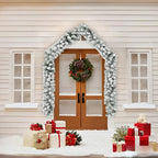 Christmas garland with gold and red ball accents on white background