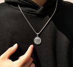 Jesus Christ pendant displayed as faith jewelry gift option