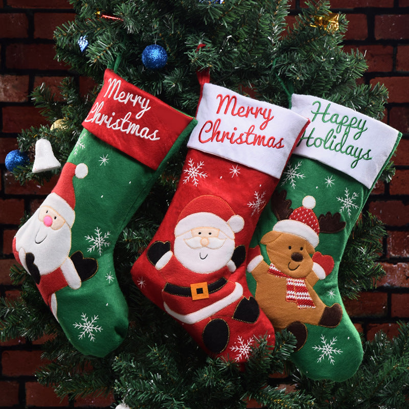 Christmas stocking pendant displayed as holiday jewelry accessory