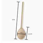 Close-up view of carved wooden Christmas spoon with natural wood finish