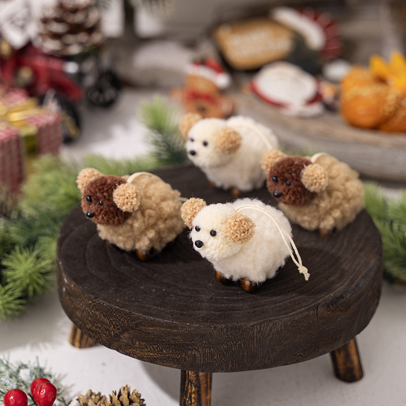 Plush felt puppy pendant on decorative holiday background