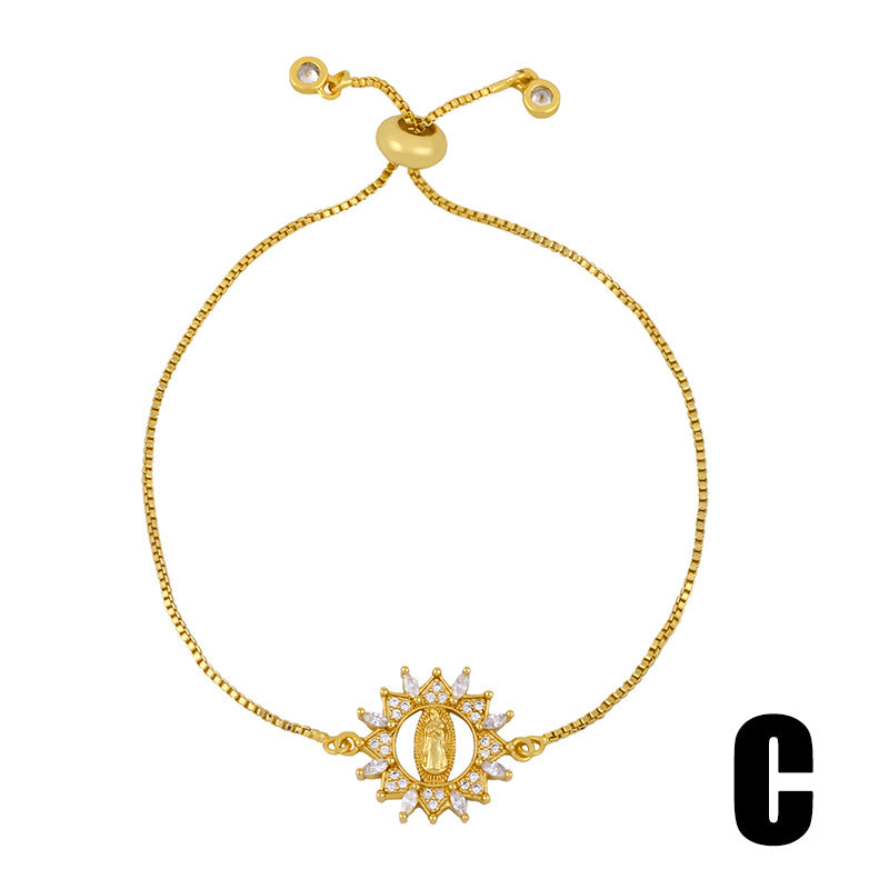 Elegant Catholic Virgin Mary bracelet featuring gold-plated setting and artificial gems