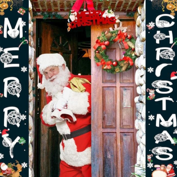 Snowman and penguin couplet Christmas decoration on festive display Main image