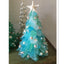 Blue ocean-inspired Christmas tree decoration on white background for home decor
