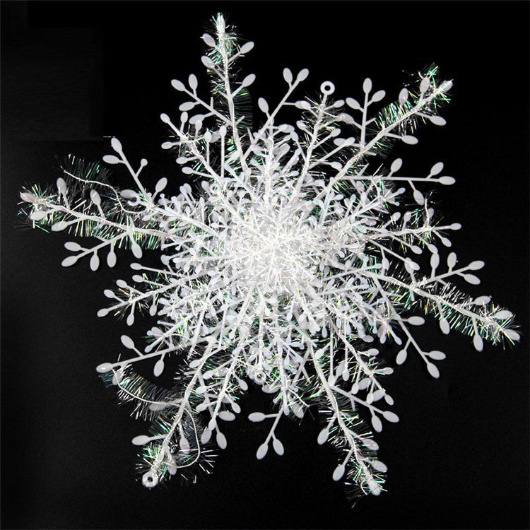 Close-up of detailed brushed plastic snowflake decoration