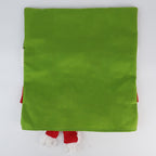 Christmas chair back covers displayed on dining chairs in a festive holiday setting