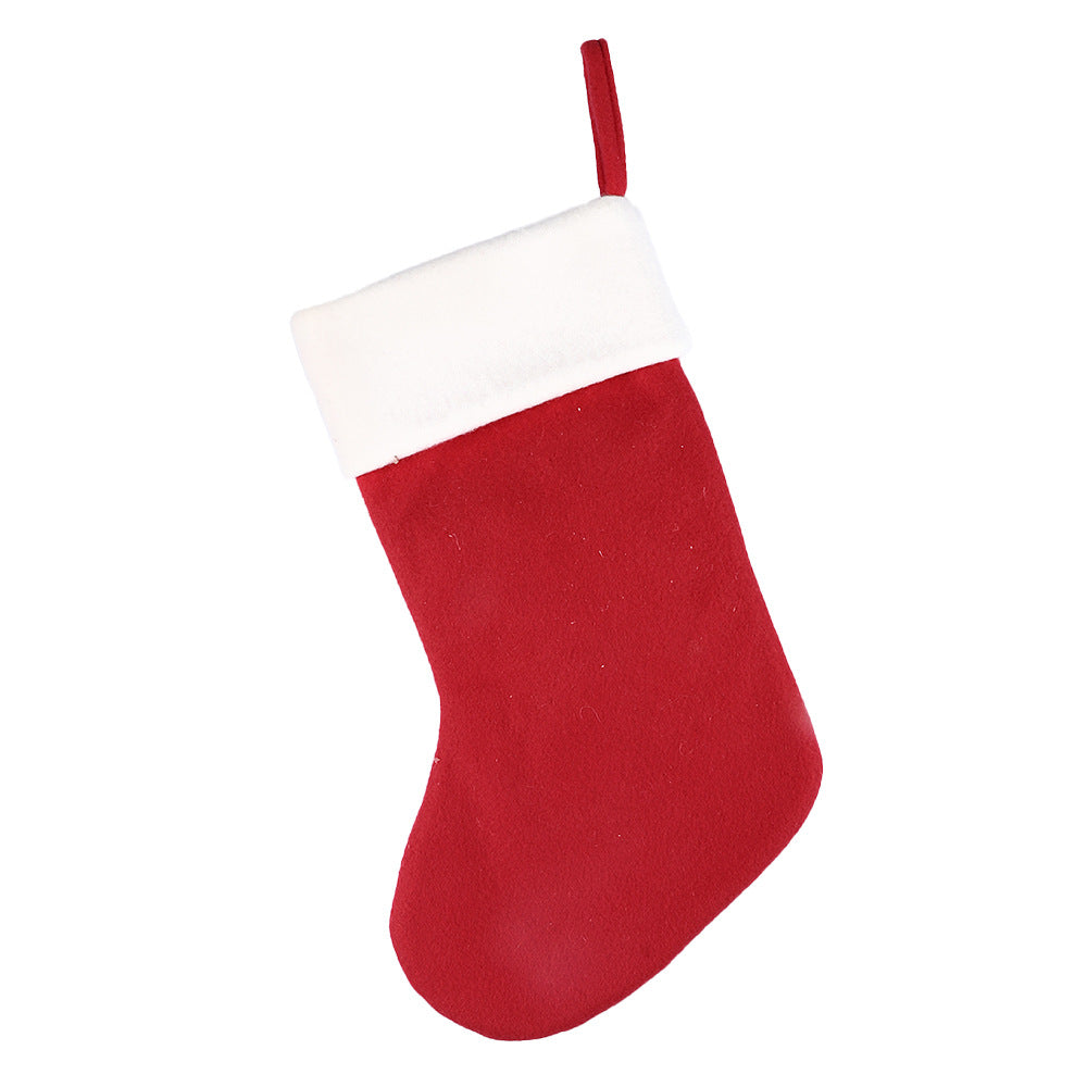 Festive red Christmas sock gift bag with cartoon puppy design for holiday celebrations