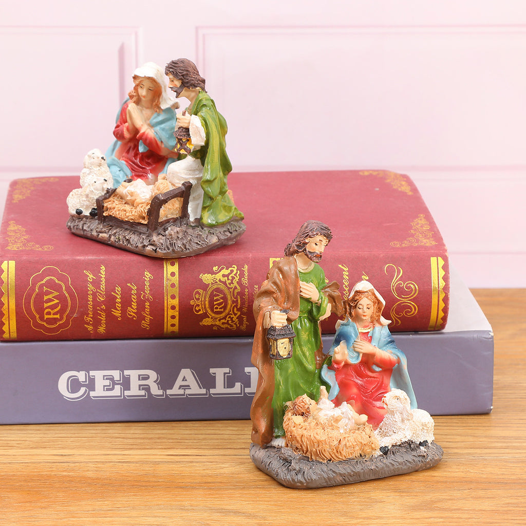 Close-up of detailed resin nativity scene showing Holy Family