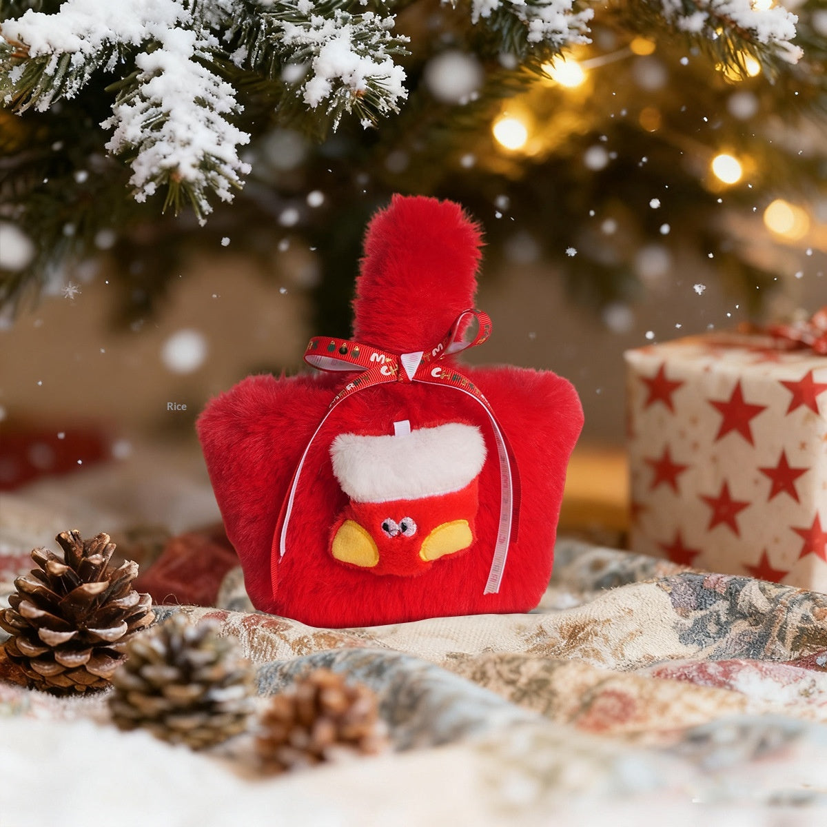 Stack of red and green plush candy bags arranged for holiday gift presentations