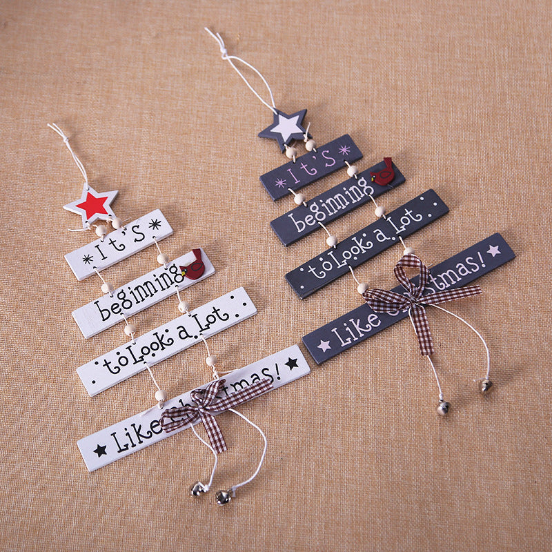 White and gray wooden star alphabet ornaments side by side - Christmas tree decor