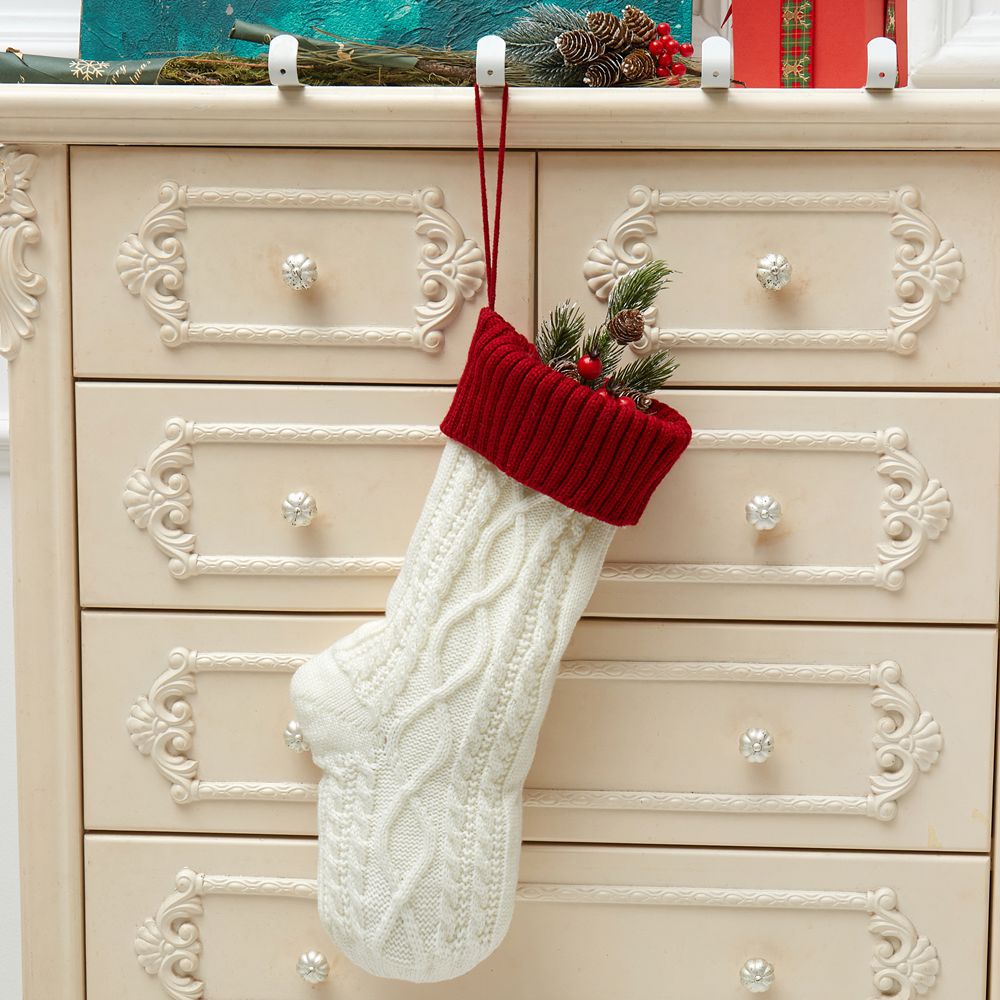 Light gray knitted Christmas stocking for modern neutral holiday themes