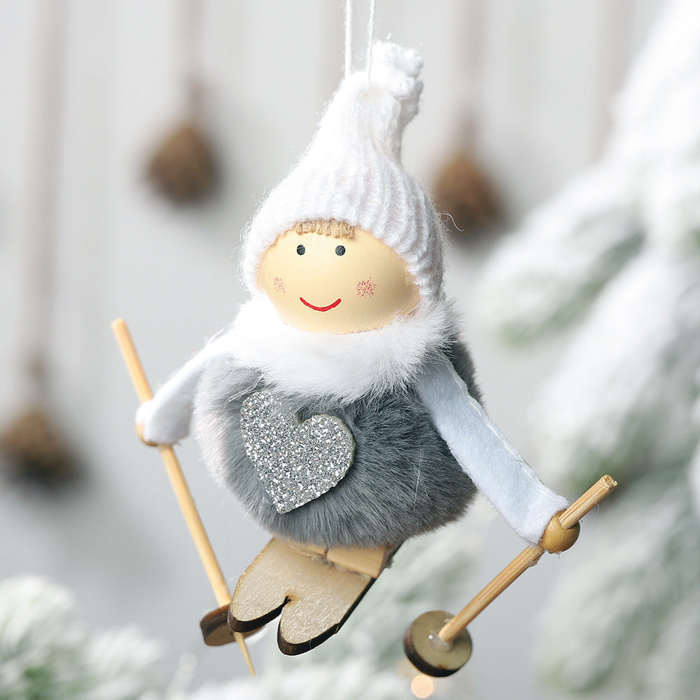 Festive pompom doll ornament displayed on decorated Christmas tree branches