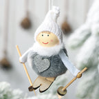 Festive pompom doll ornament displayed on decorated Christmas tree branches
