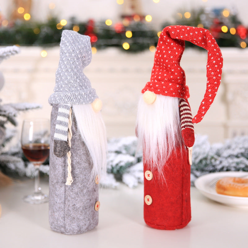 Christmas table decor featuring wine bottle covers as festive centerpieces