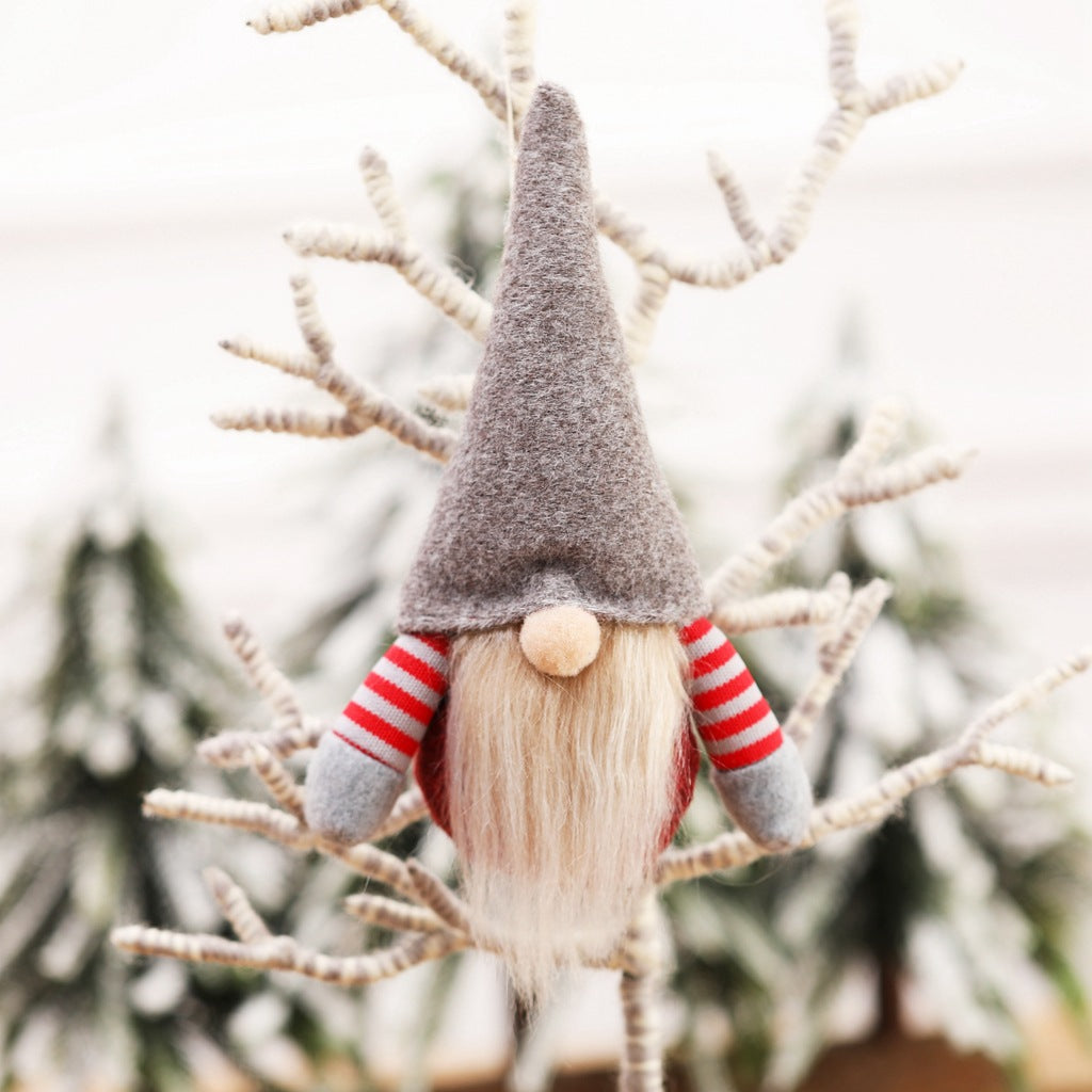 Red Christmas doll pendant showcasing festive fabric craft