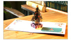 3D-style Christmas greeting card with evergreen tree design
