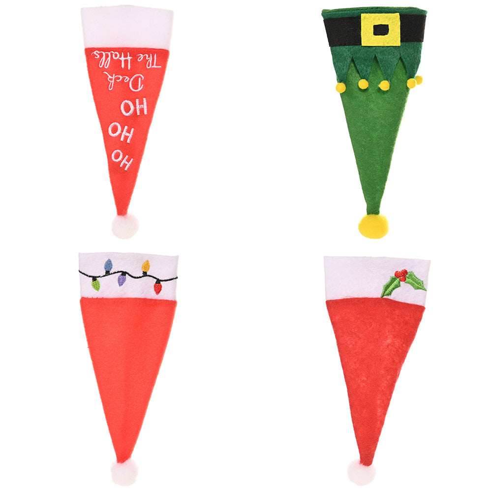 Holiday dining decor featuring Christmas hat and fork set