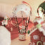 Festive iron Christmas ornament featuring Santa Claus design for holiday tree