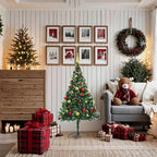 Illuminated Christmas tree with stylish branches and colorful baubles at evening
