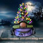 Lighted cartoon Christmas tree resin sculpture ornament in festive holiday setting