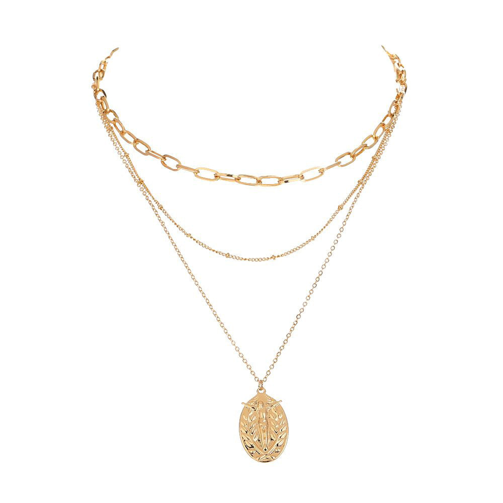 Jesus geometric pendant necklace with gold-tone finish on layered chains