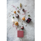 Classic glass ornament with glitter and painted holiday motif