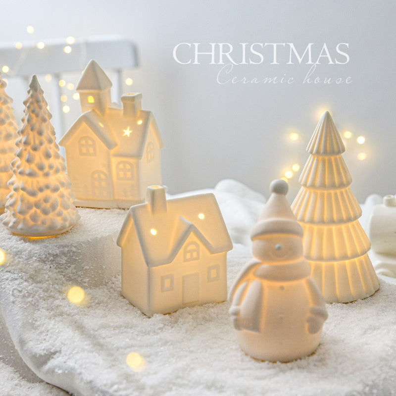 Festive ceramic Christmas decorations arranged together showing collection variety