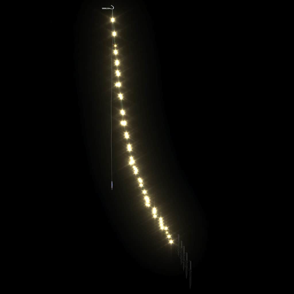Modern LED Christmas tree with warm white glow complementing holiday decorations
