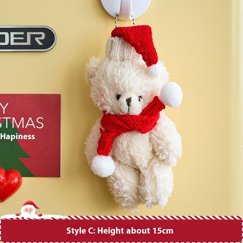Christmas scene decoration featuring soft plush ornament in a cozy holiday setting