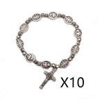 Rose colored beads strung in rosary pattern with Madonna centerpiece