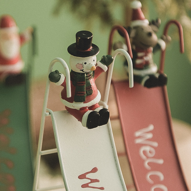Wrought iron Christmas ornaments showcasing traditional holiday characters for seasonal decorating