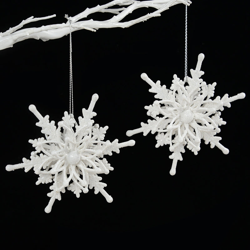 White snowflake hanging ornament with delicate 3D detail