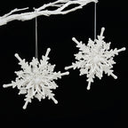 White snowflake hanging ornament with delicate 3D detail