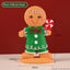 Gingerbread man Christmas ornament on festive background for holiday decorating