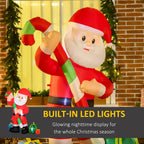 Multi-colored 6-foot Christmas inflatable Santa decoration with candy cane and gift boxes illuminated at night