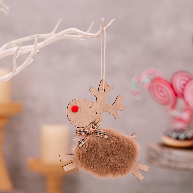 Set of colorful wooden elk ornaments arranged for Christmas
