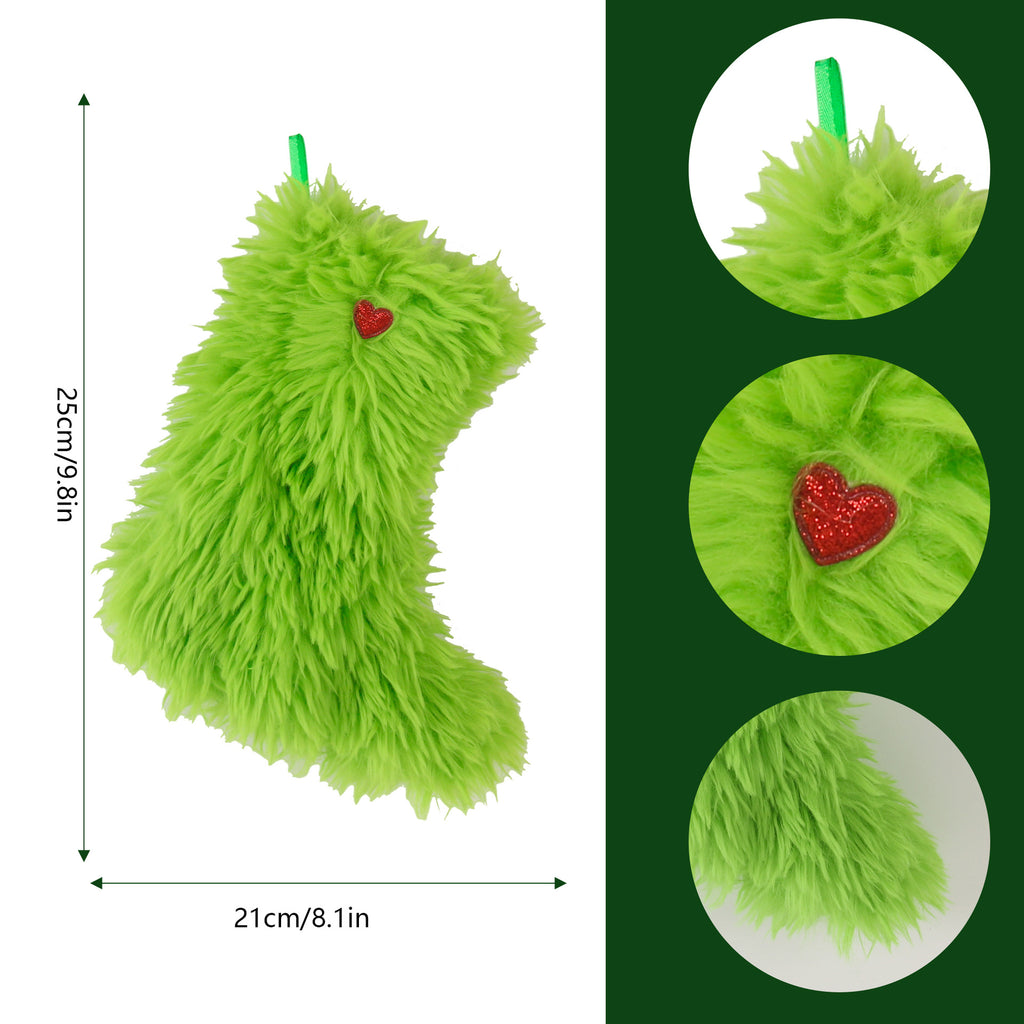 Christmas plush stocking ornament showing decorative design and gift bag style