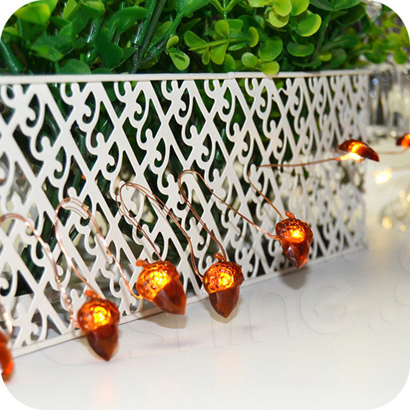 Warm white LED Christmas string lights with 20 glowing bulbs on a 2-meter wire, perfect for holiday decorating Main image