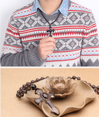 Obsidian cross pendant styled on model - Christian gift