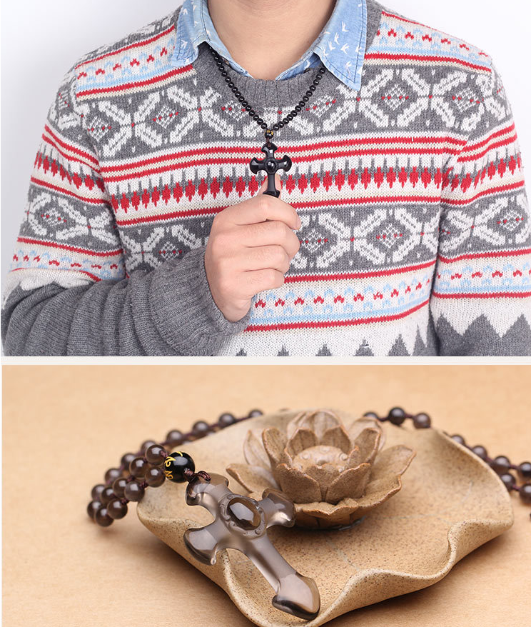 Obsidian cross pendant styled on model - Christian gift