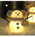 Luminous winter-themed Christmas tree ornament with soft glow