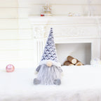 Faceless doll Christmas decoration in window scene setting