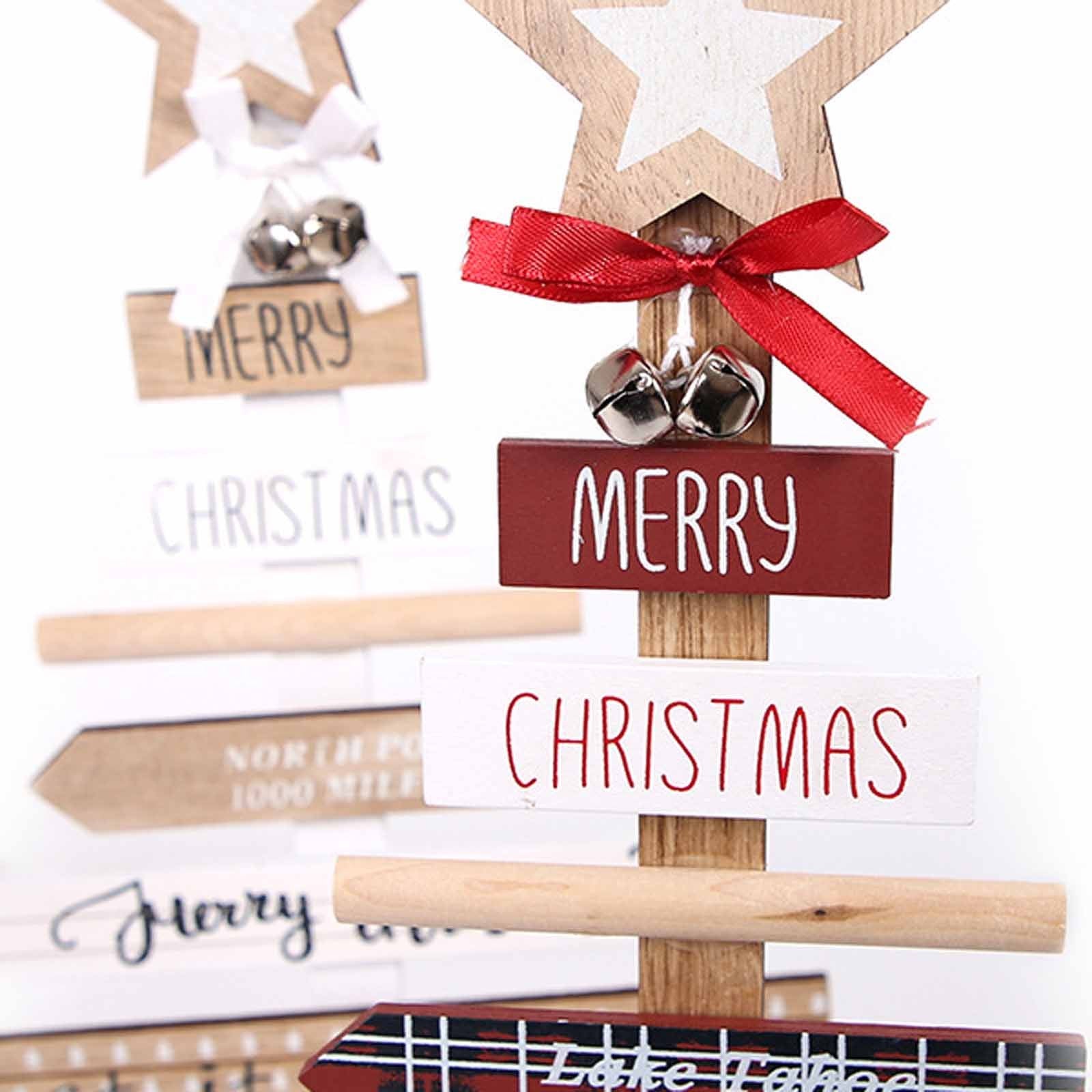 Wood Christmas tree letter decoration displayed on rustic shelf with warm lighting Main image