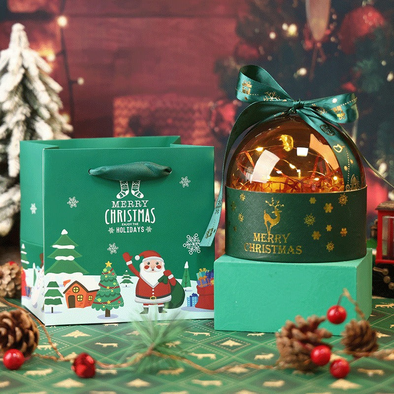 Transparent acrylic holiday gift box with candy and treats inside
