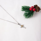 Minimalist cross necklace with flower motif, casual everyday style
