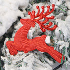 Holiday tree ornament with classic reindeer motif